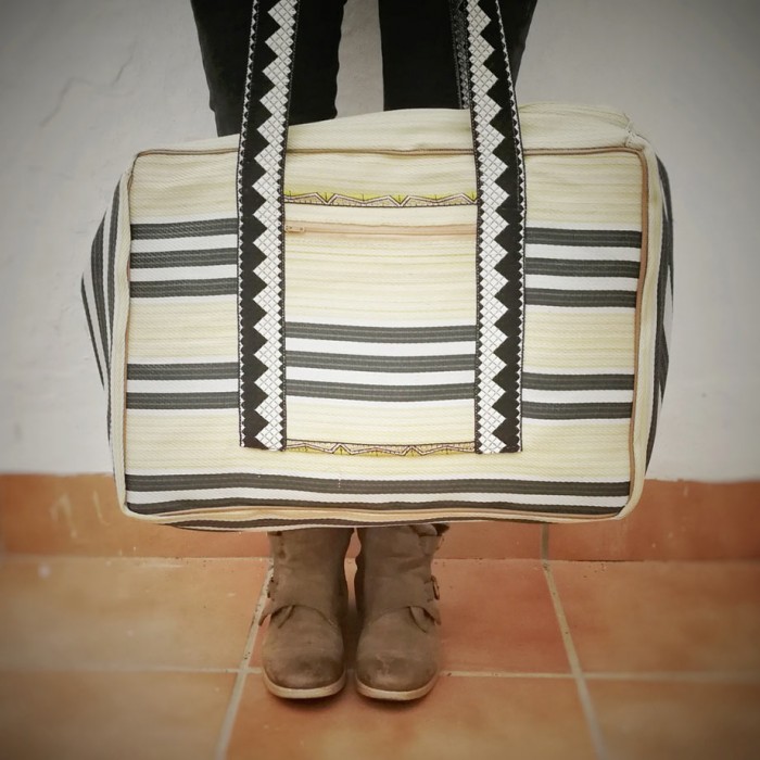 Pale yellow and black Weekend bag